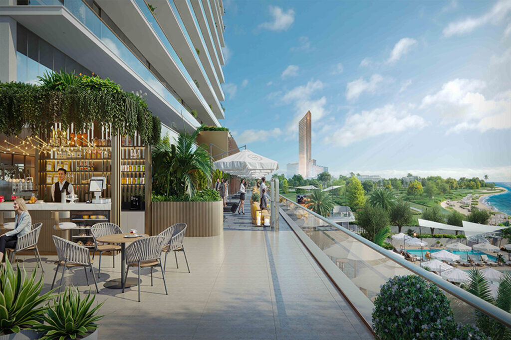 Outdoor lounge and dining terrace at Sheraton Residences Al Marjan Island Ras Al Khaimah